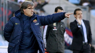 Martino agradece paciência do herói Pedro e elogia Barça por não perder a cabeça após 'apagão' Gerardo Martino orienta o Barcelona na grande vitória de virada sobre o Getafe