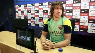 Puyol vê críticas injustas contra Tata e diz: 'Estamos com ele até a morte' Puyol disse que Tata Martino está respaldado pela equipe 'até a morte'
