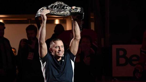 Georges St-Pierre com o cinturão do peso médio do UFC Georges St-Pierre com o cinturão do peso médio do UFC