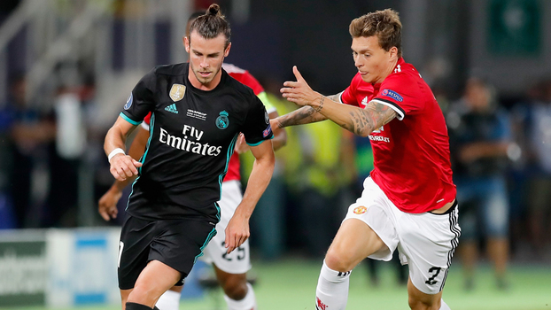Gareth Bale, do Real Madrid, disputa bola com Victor Lindelof, do Manchester United, durante partida válida pela final da Supercopa da UEFA Gareth Bale, do Real Madrid, disputa bola com Victor Lindelof, do Manchester United, durante partida válida pela final da Supercopa da UEFA