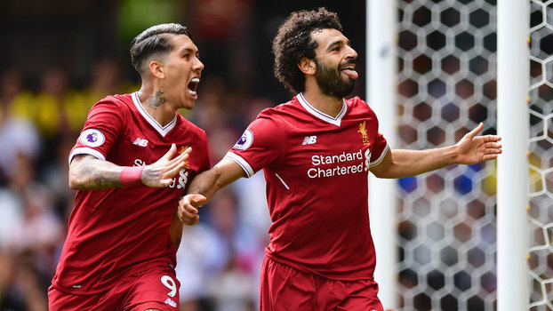 Roberto Firmino e Salah celebram o gol da virada do Liverpool sobre o Watford Roberto Firmino e Salah celebram o gol da virada do Liverpool sobre o Watford